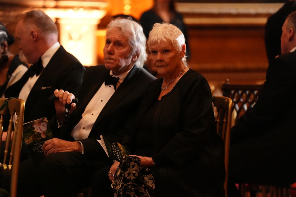 Dame Judi Dench (R) with her partner David Mills in 2026.