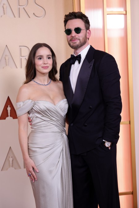 Alba Baptista
and Chris Evans
