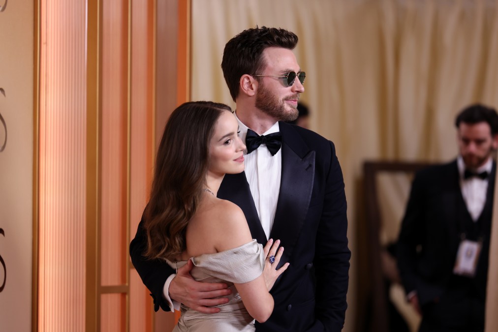 Alba Baptista
and Chris Evans