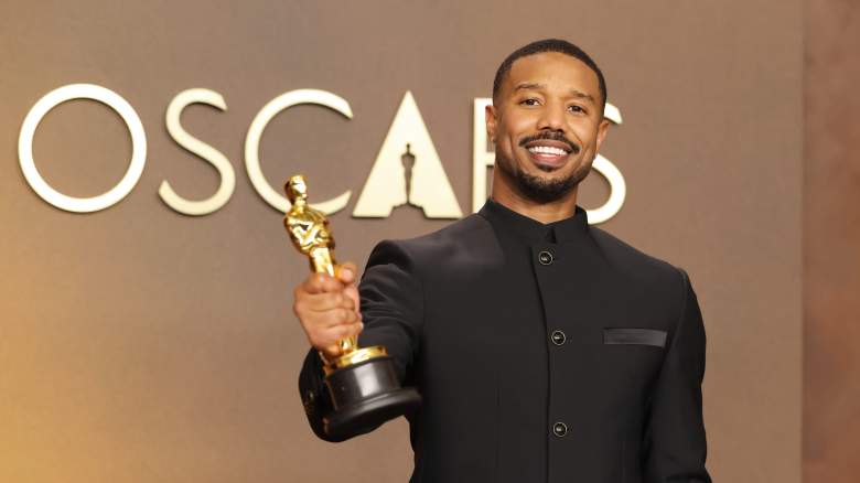Michael B. Jordan holds Oscar