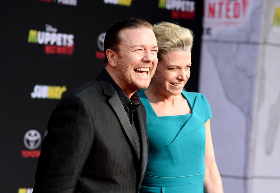 Acor Ricky Gervais and Jane Fallon arrive at the premiere Of Disney's "Muppets Most Wanted" 