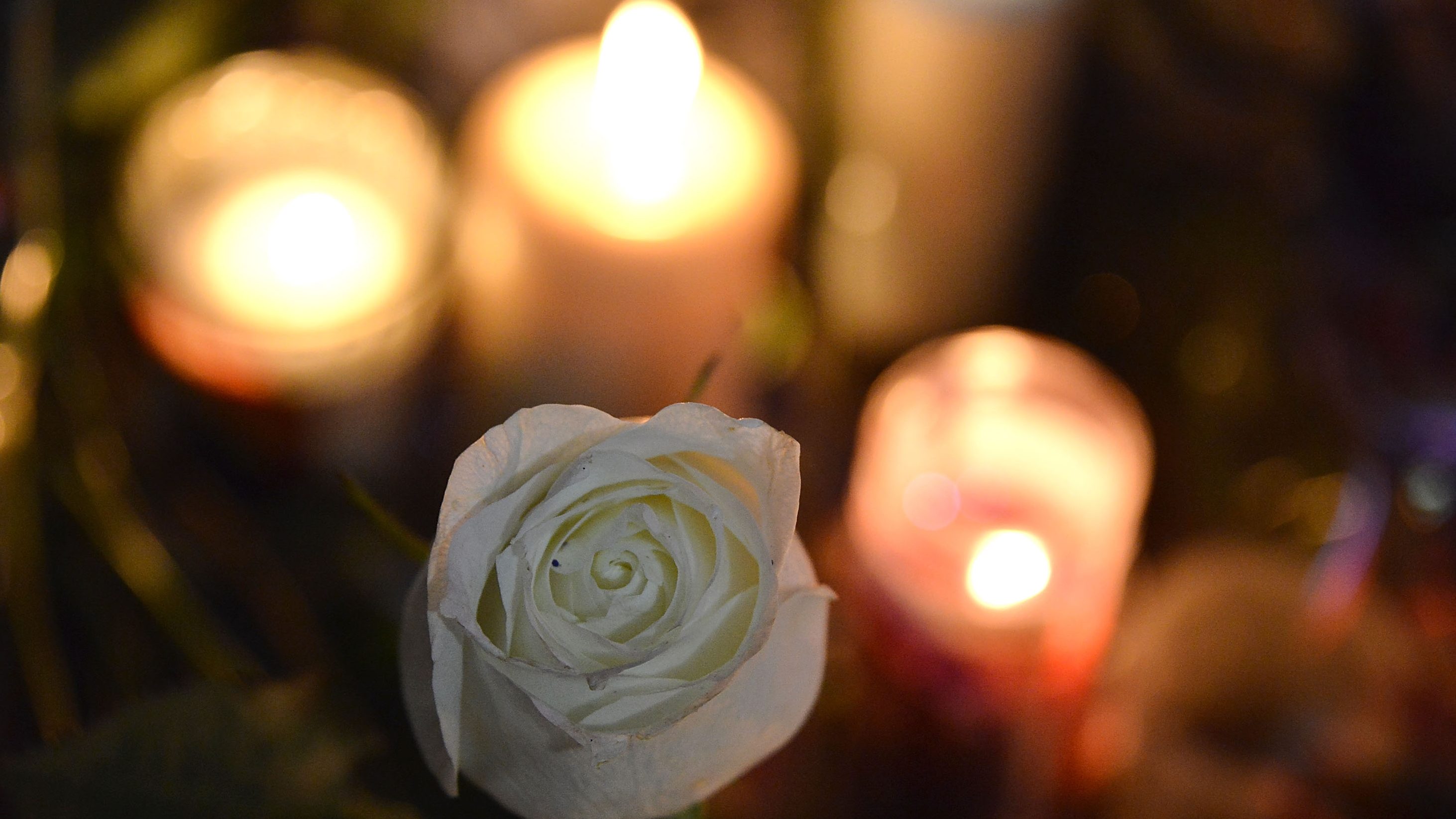 Candles and flowers for Daniel Moody.