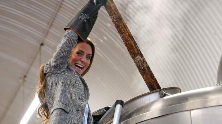 Britain's Catherine, Princess of Wales stirs in a brewhouse kettle as she tours the brewery during a visit of the Southwark Brewing Company at the Bermondsey Beer Mile on March 12, 2026 in London, England