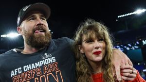 Travis Kelce #87 of the Kansas City Chiefs (L) celebrates with Taylor Swift after defeating the Baltimore Ravens in the AFC Championship Game at M&T Bank Stadium on January 28, 2024 in Baltimore, Maryland