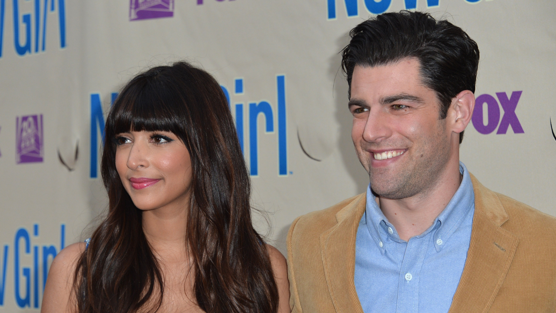 Hannah Simone and Max Greenfield
