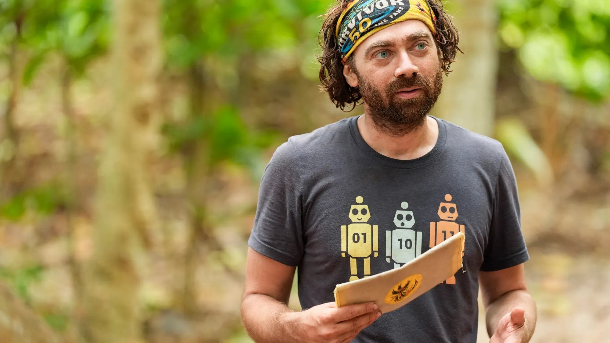 Christian Hubicki speaking during a challenge on “Survivor 50”