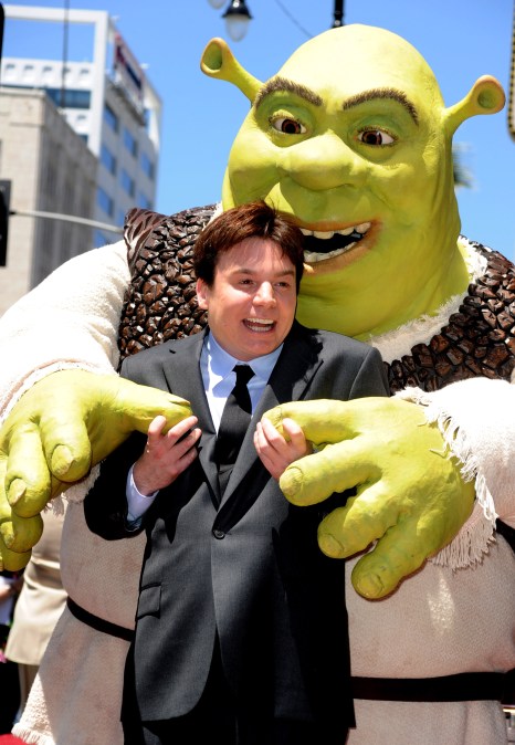 Actor Mike Myers poses with Shrek who was honored on The Hollywood Walk Of Fame 