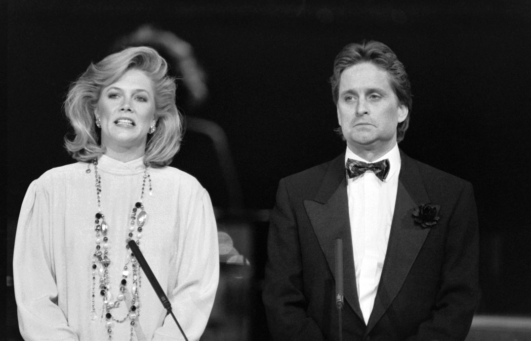 US actor Michael Douglas and US actress Kathleen Turner are pictured during 11th nuit des Cesar ceremony, on February 22, 1986, in Paris. 