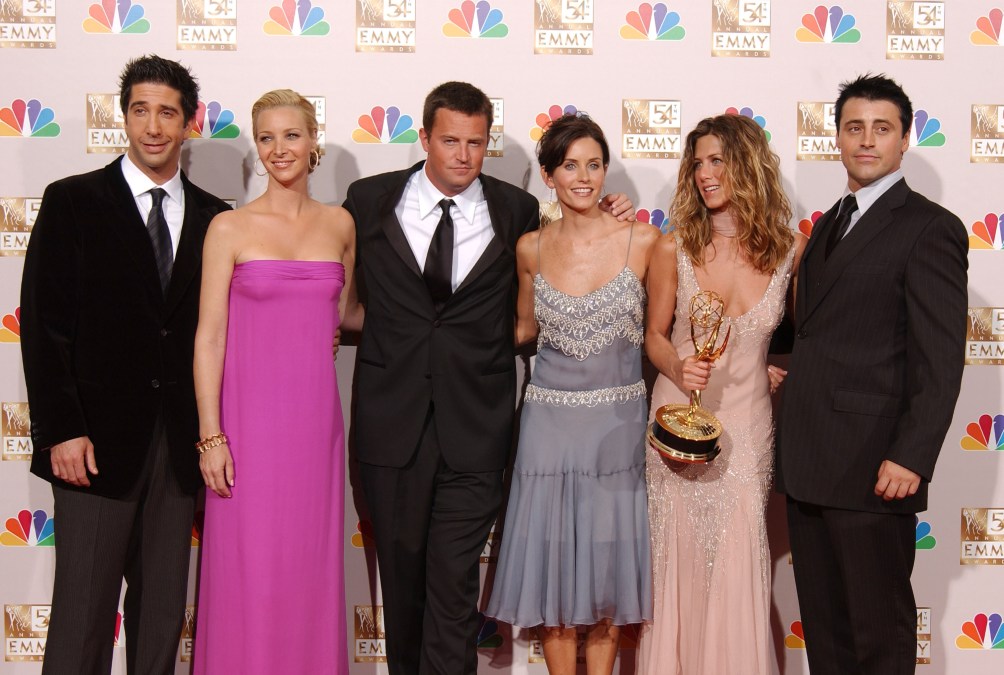 David Schwimmer, Lisa Kudrow, Matthew Perry, Courteney Cox Arquette, Jennifer Aniston and Matt LeBlanc pose backstage during the 54th Annual Primetime Emmy Awards.