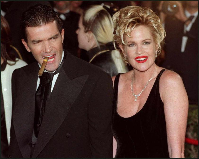Actors Antonio Banderas and Melanie Griffith arrive at the premiere of "Evita"