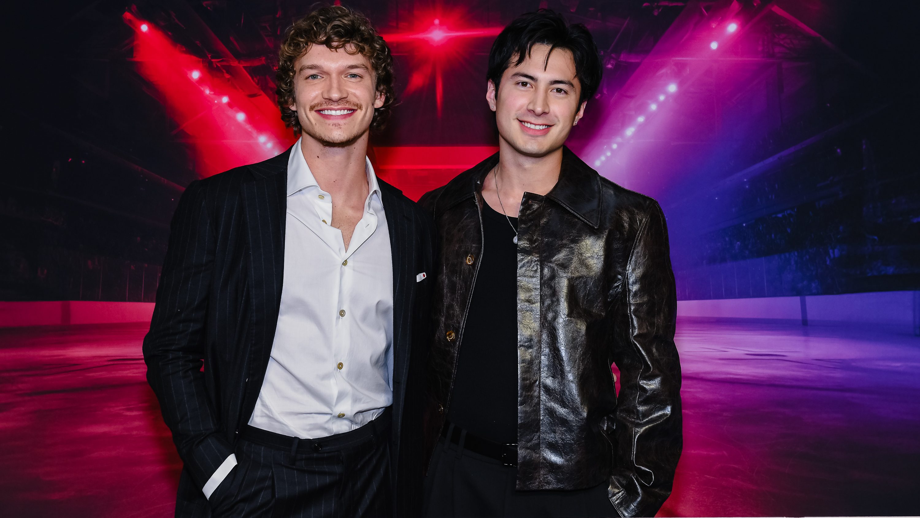 Connor Storrie and Hudson Williams attend the premiere of "Heated Rivalry" at TIFF Lightbox on November 24, 2025.