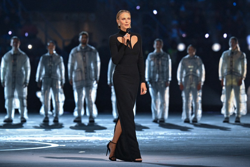 Charlize Theron delivers a speech during the opening ceremony of the Milano Cortina 2026 Winter Olympic Games.