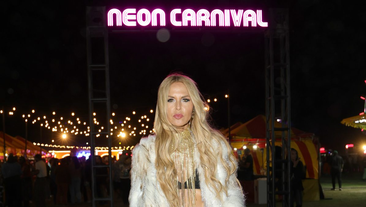 Rachel Zoe attends Neon Carnival at Coachella in Thermal California wearing a statement outfit