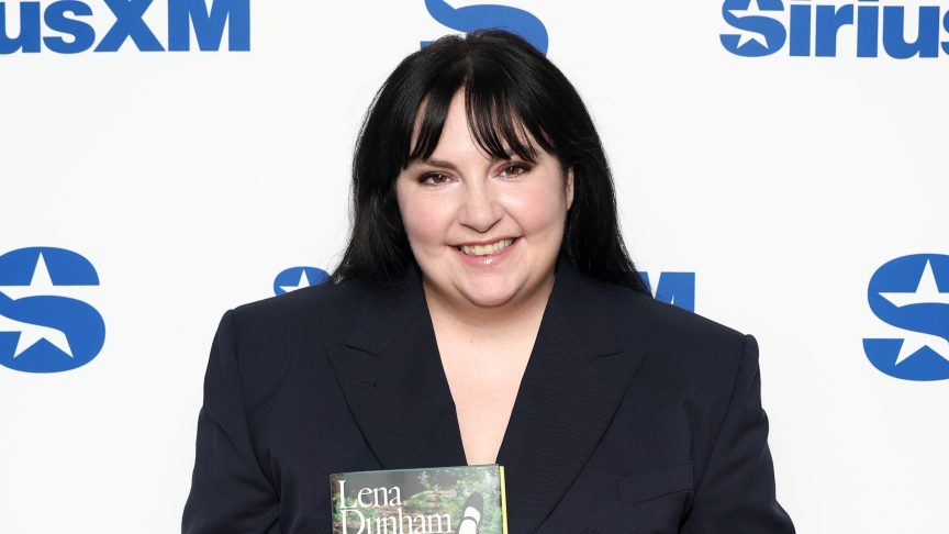 Lena Dunham holds her memoir Famesick while attending a SiriusXM event hosted by Andy Cohen in New York City