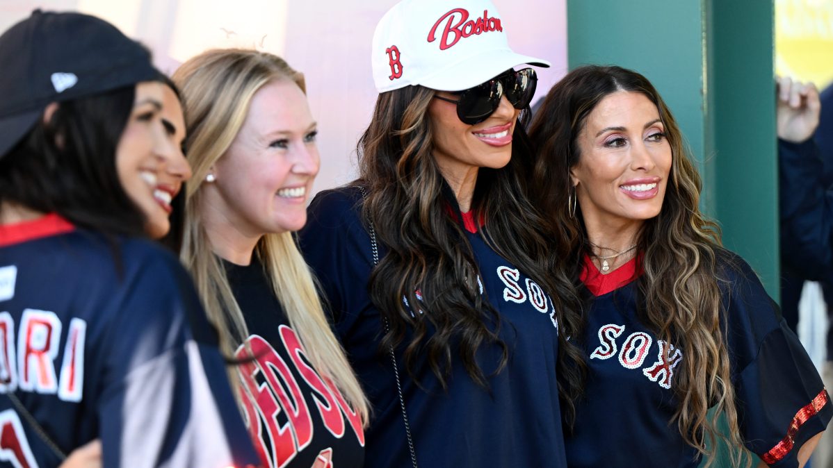 Alicia Carmody and Rulla Nehme Pontarelli pose at Fenway Park before a Boston Red Sox game