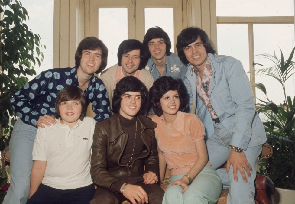 Alan Osmond (left, top row) with his famous family.