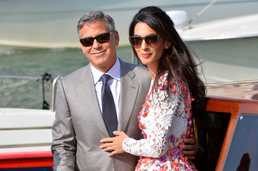 George Clooney and his wife Amal Alamuddin leave the Aman Hotel on September 28, 2014 in Venice. Hollywood.