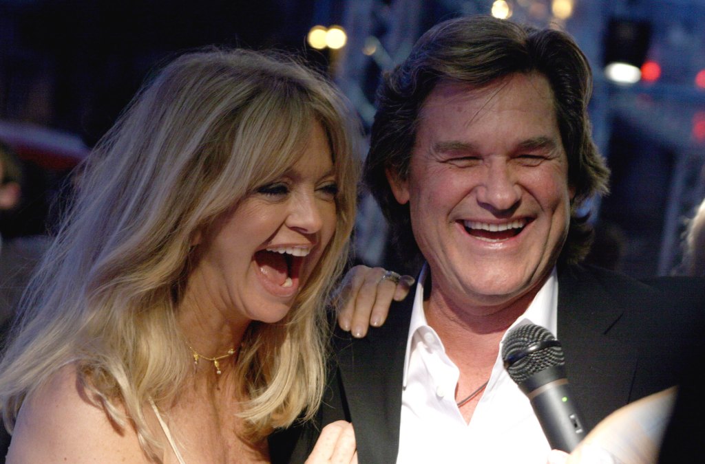 Actors Kurt Russell and Goldie Hawn speak with the media as they attend the Italian Premiere of "Poseidon" at Cinema Adriano on May 31, 2006 in Rome, Italy.