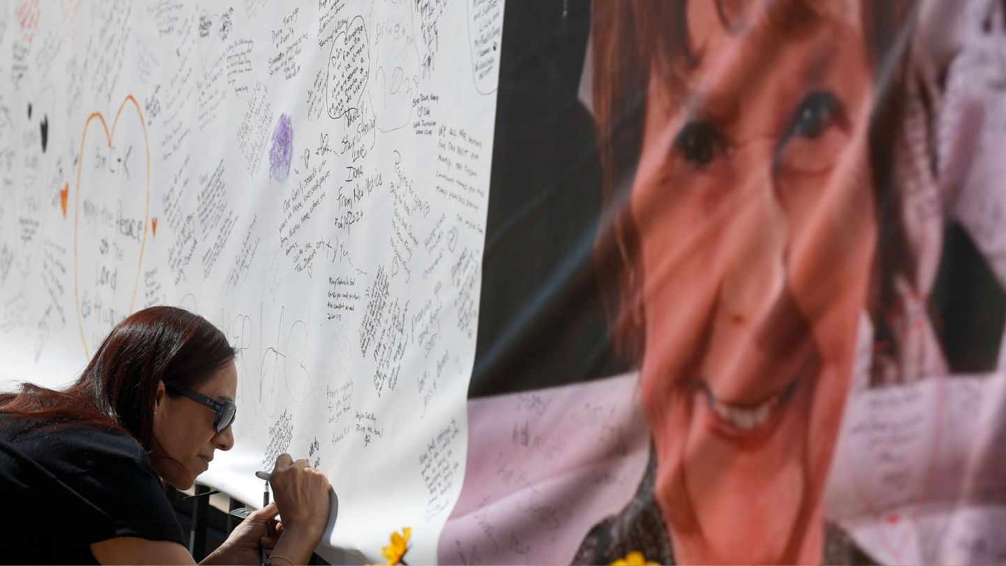 Catalina Ochoa visits a memorial for Nancy Guthrie in front of the KVOA news station on March 03, 2026 in Tucson, Arizona. One month after Nancy Guthrie, the 84-year-old mother of U.S. journalist and television host Savannah Guthrie, went missing, law enforcement officials continue to analyze evidence from the crime scene and follow leads and tips from the public