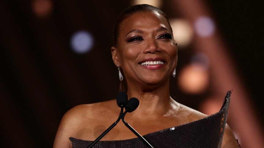 Queen Latifah smiling onstage at the CinemaCon 2026 event