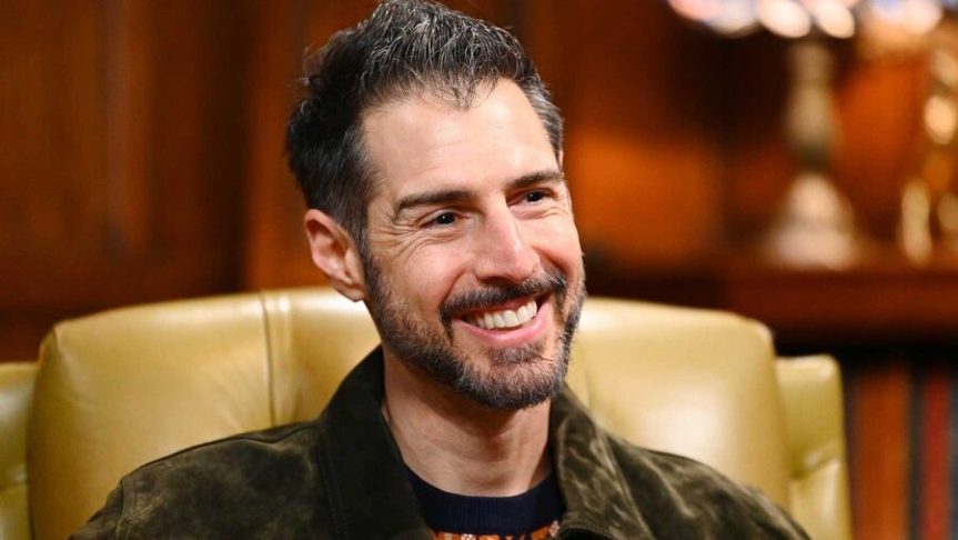 Rob Cesternino smiling during an interview appearance