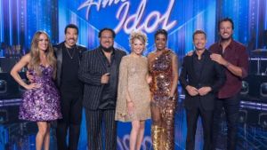 The host, contestants, and judges for the season 24 American Idol finale