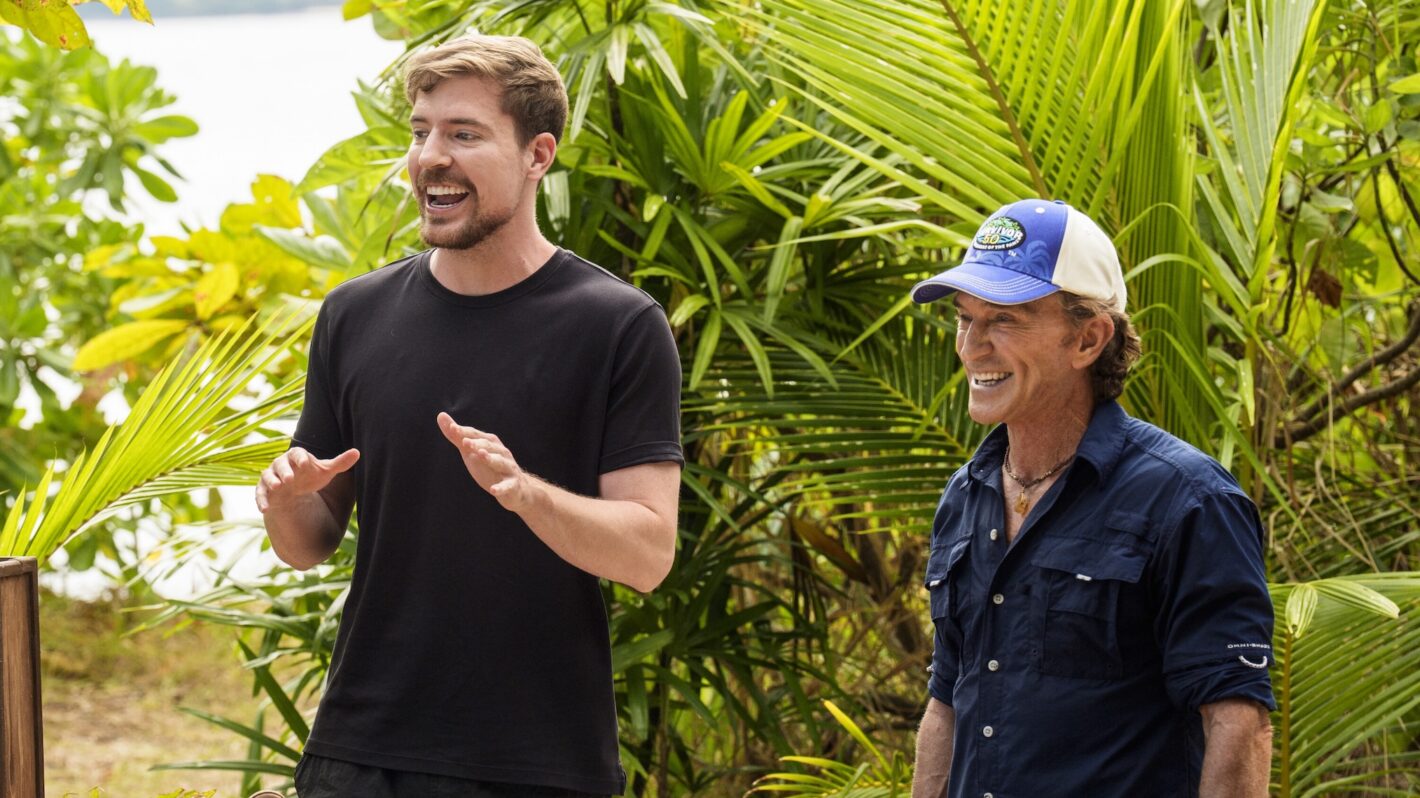 MrBeast speaking beside Jeff Probst during a Survivor 50 challenge segment