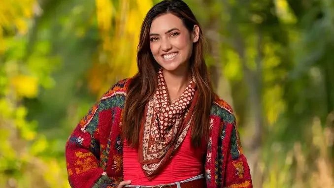 “Survivor 49” winner Savannah Louie smiles in a promotional cast photo.