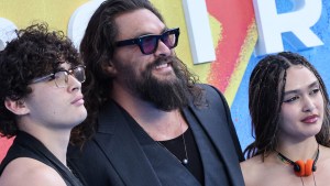 Jason Momoa attends the Supergirl event with his children