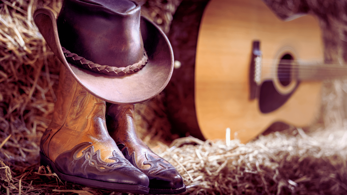 cowboy boots, hat and guitar