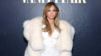 Jennifer Lopez Brings Old Hollywood Glamour to Paris Fashion Week in White Feather Dress