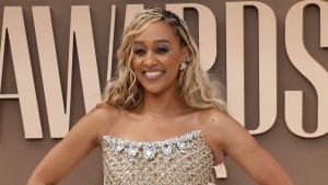 Tia Mowry smiling on the BET Awards red carpet