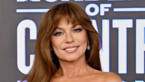 Shania Twain smiling on the red carpet