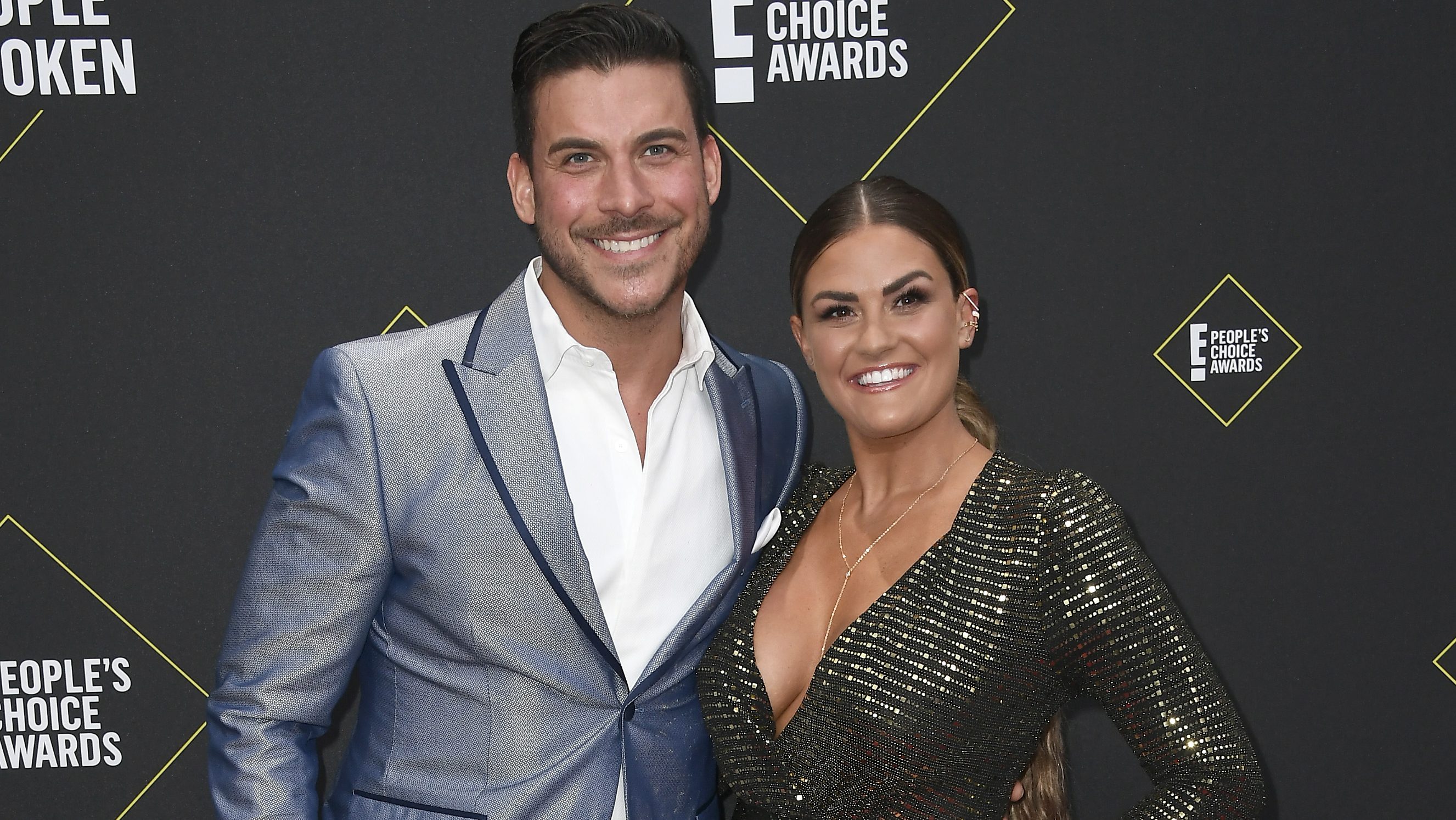 Jax Taylor and Brittany Cartwright pose together on the red carpet at the 2019 E! People's Choice Awards in Santa Monica.