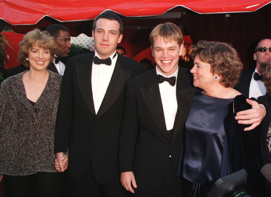 Actor-writers Ben Affleck (2nd left) and Matt Damon (3rd left) arrive with their mothers Chris (L) and Nancy at the 70th Annual Academy Awards 23 March in Los Angeles, CA. Affleck and Damon are nominted for best original screenplay for "Good Will Hunting."