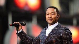 John Legend will portray the legendary activist and musician Harry Belafonte in the new film "The Road Home" about Paul Simon's "Graceland" album and the controversy surrounding its release.