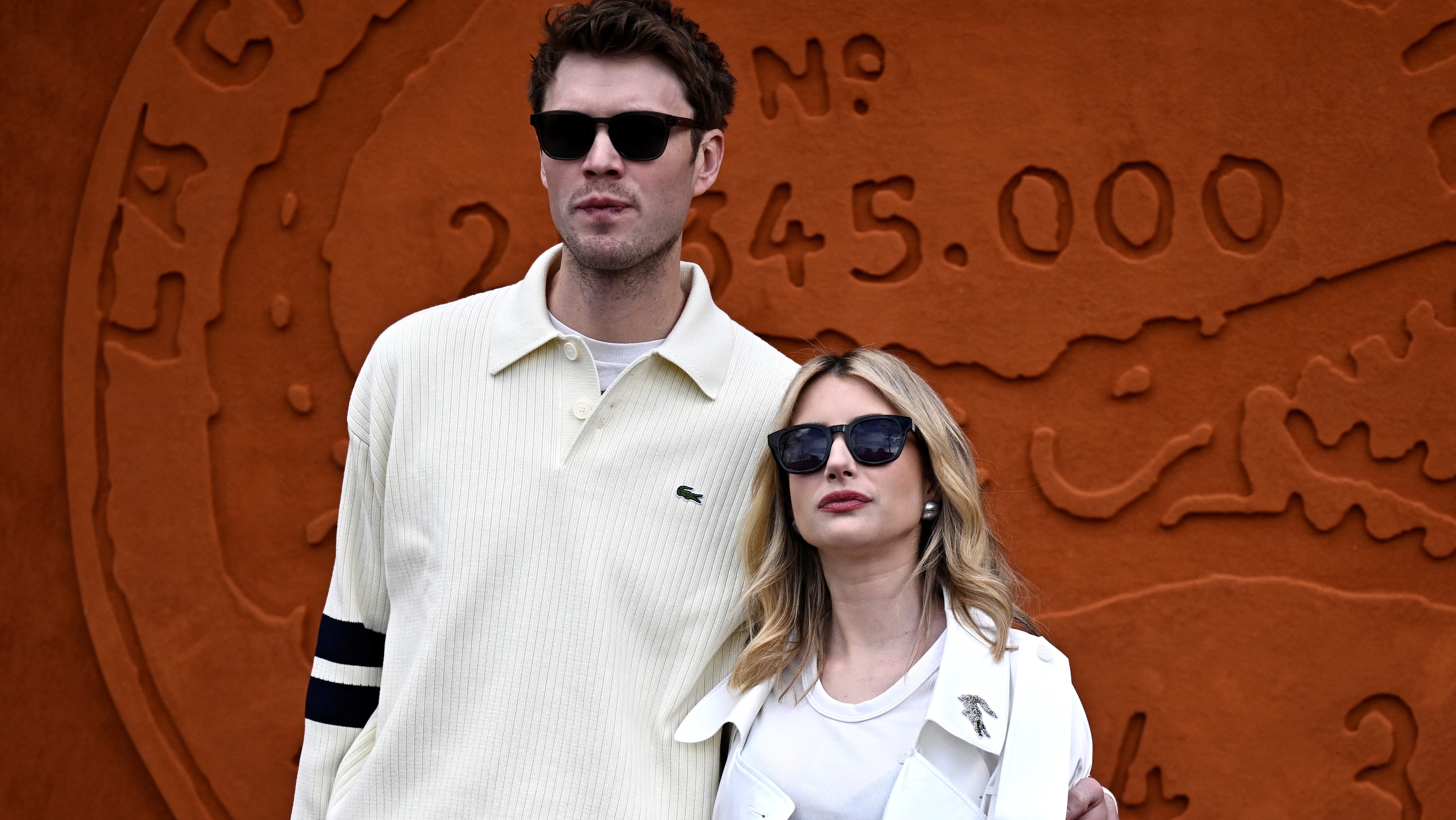 US Actress Emma Roberts (R) and Cody John pose for a photocall ahead of the presentation of creations by Lacoste for the Women Ready-to-wear Fall-Winter 2024/2025 collection as part of the Paris Fashion Week, in Paris on March 5, 2024.
