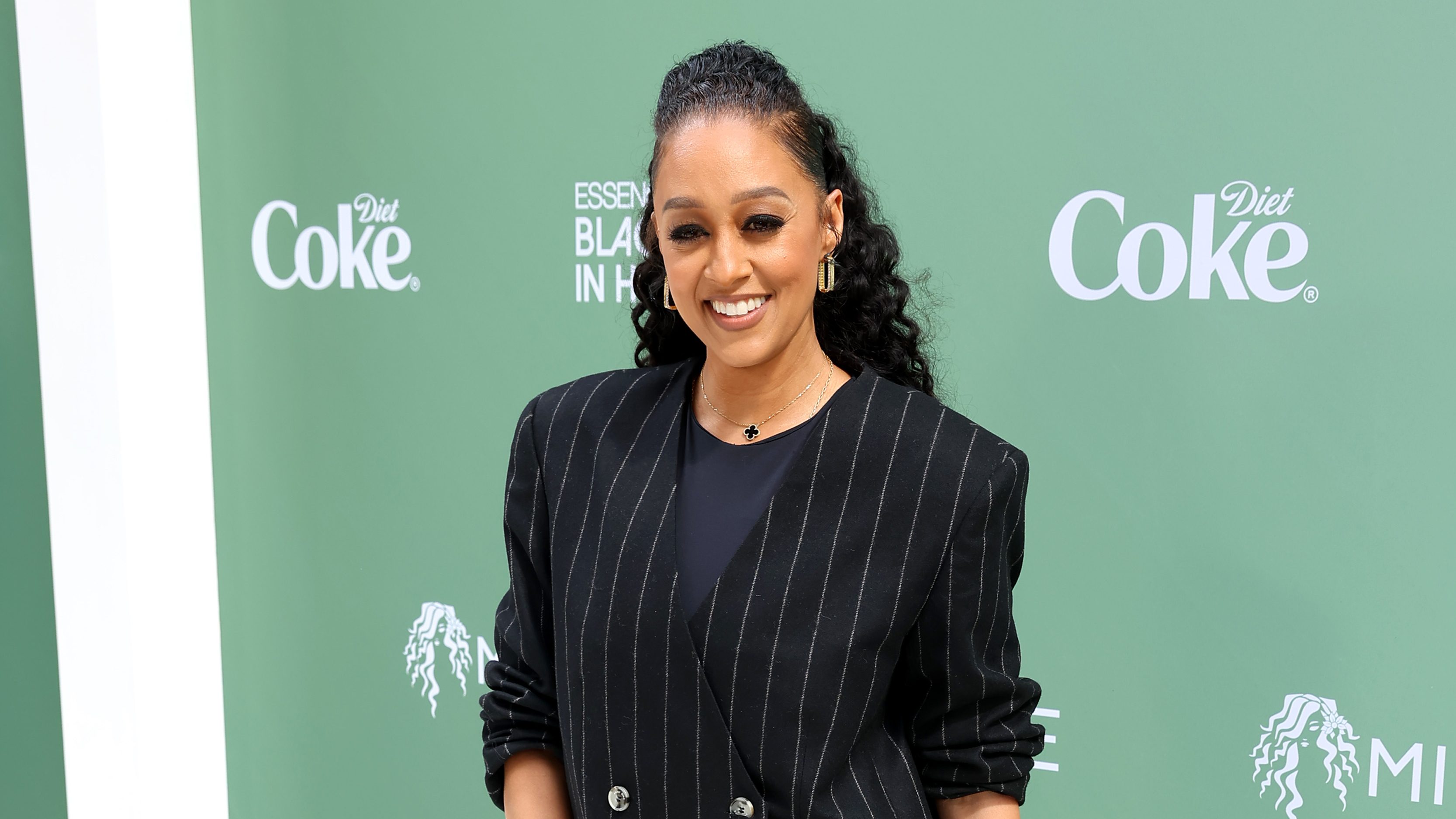 Tia Mowry smiling on the red carpet