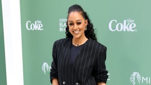 Tia Mowry smiling on the red carpet