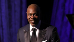 Dave Chappelle performing onstage