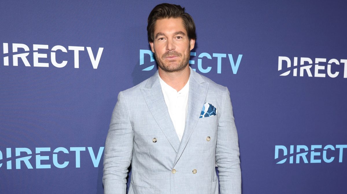 Craig Conover poses on the blue carpet at the DIRECTV Plot Twist Featuring Bravo event in New York City.