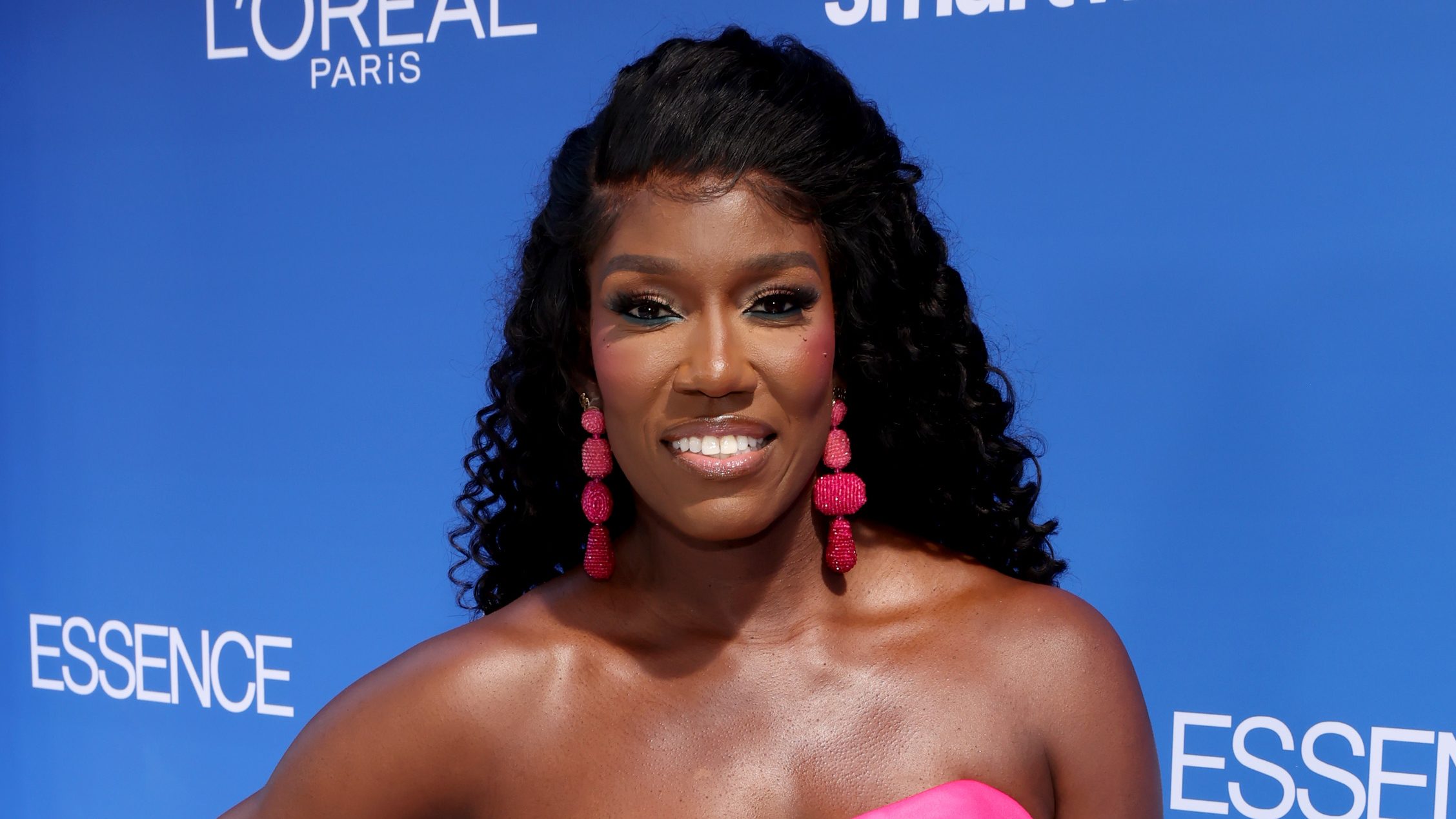 Bozoma Saint John smiles on the red carpet at the 2026 ESSENCE Black Women in Hollywood Awards in Los Angeles.