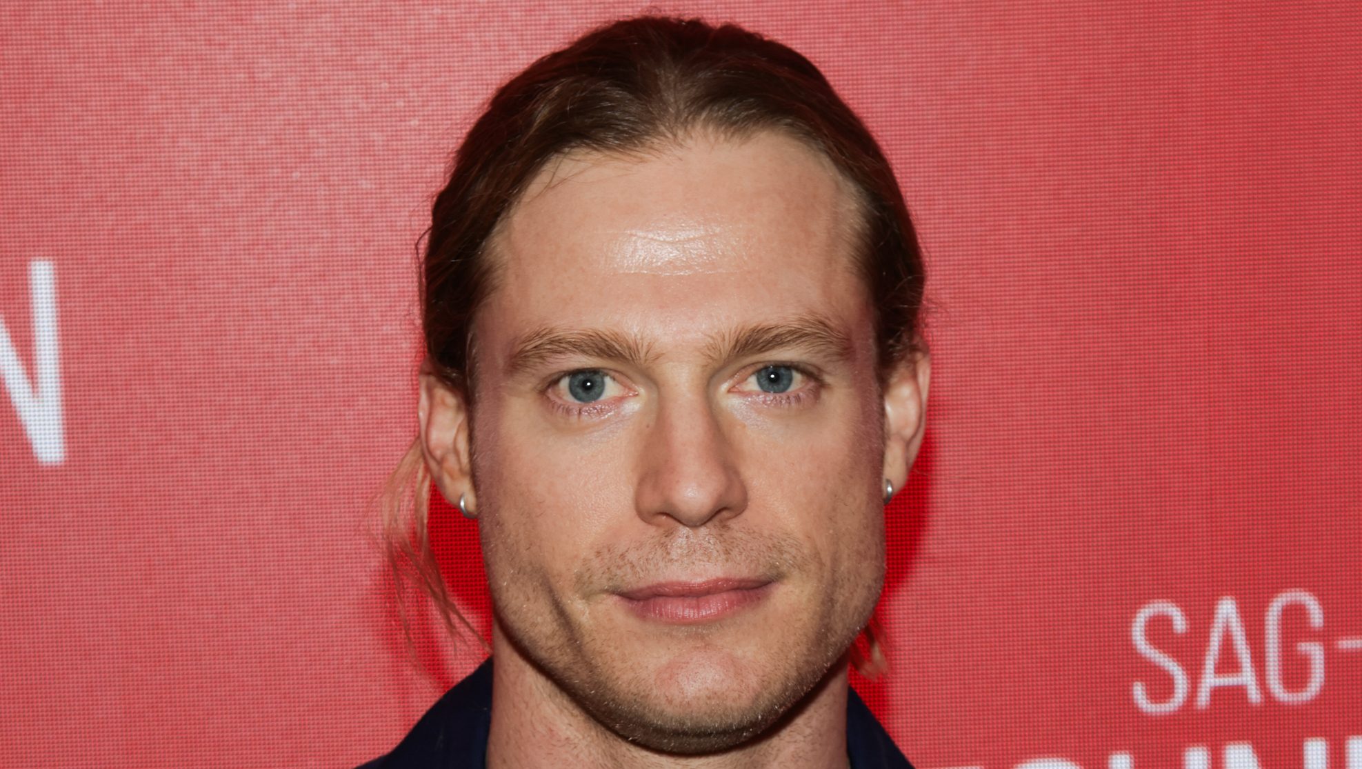 Sam Reid posing at the SAG-AFTRA Conversations: "The Vampire Lestat" at SAG-AFTRA Foundation Robin Williams Center.