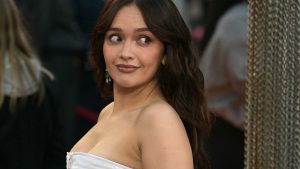 Olivia Cooke wearing a white gown at the premiere of House of the Dragon Season 3