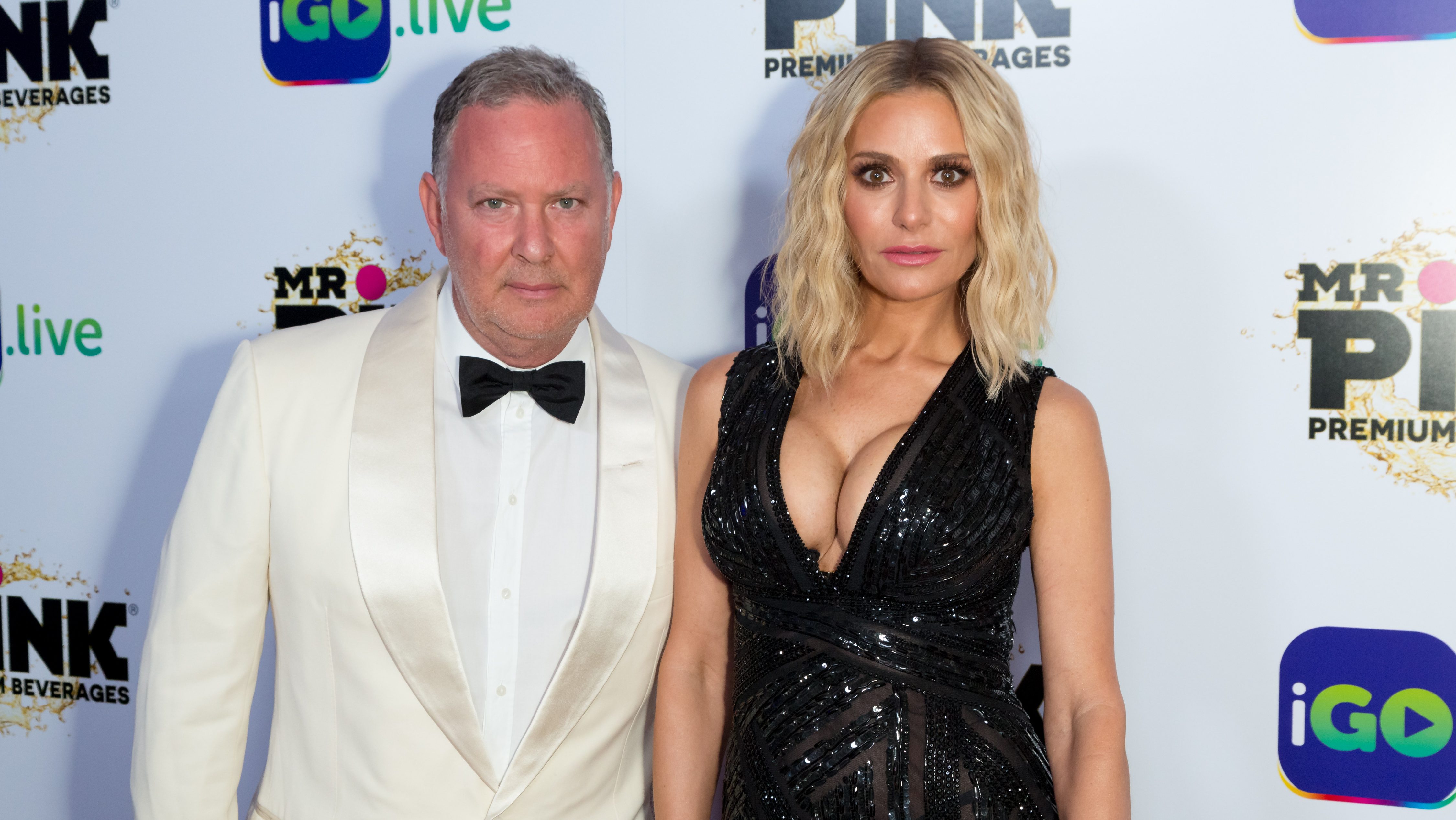 Dorit Kemsley and PK Kemsley pose together on the red carpet at the iGo.live launch event in Beverly Hills in 2017.