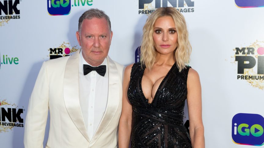 Dorit Kemsley and PK Kemsley pose together on the red carpet at the iGo.live launch event in Beverly Hills in 2017.