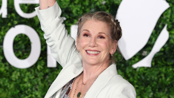 Melissa Gilbert smiling and waving at an event