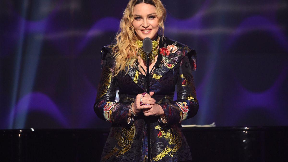 Madonna speaks on stage at the Billboard Women in Music 2016 event.