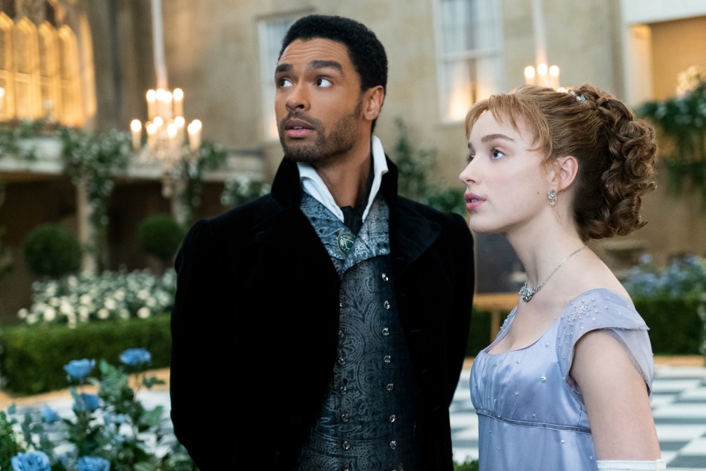 REGÉ-JEAN PAGE as SIMON BASSET and PHOEBE DYNEVOR as DAPHNE BRIDGERTON