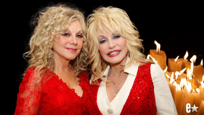 Dolly Parton attend Stella Parton smiling at an event